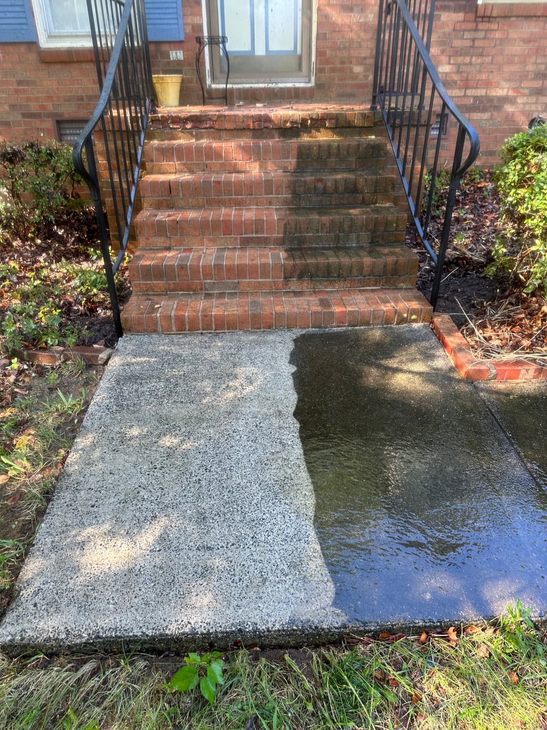 Before and after cleaning of brick stairs and concrete sidewalk showing significant difference.