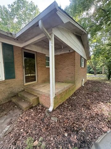 Gallery photos for Stunning Brick Home Restoration in [Location]: Image #1